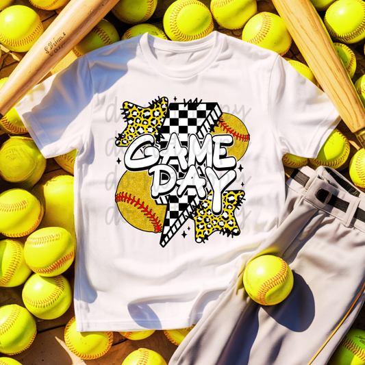White t-shirt with 'Game Day' design on a background of yellow softballs and baseball bats.