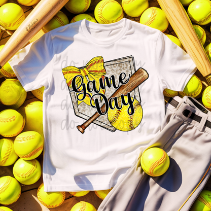 White t-shirt with 'Game Day' design surrounded by softballs and bats